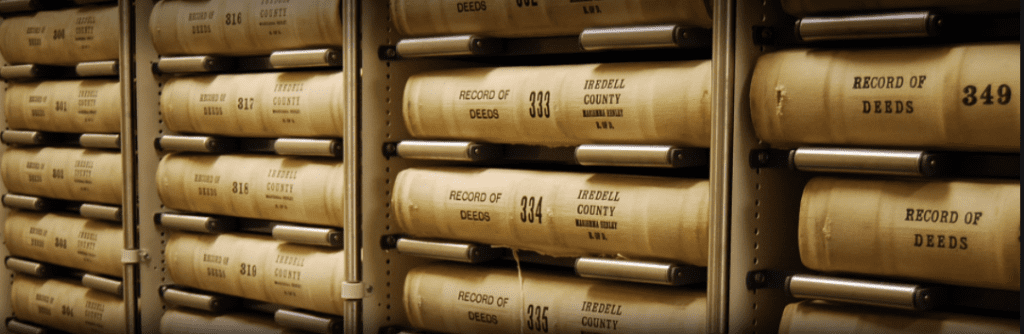stack of books in recording office