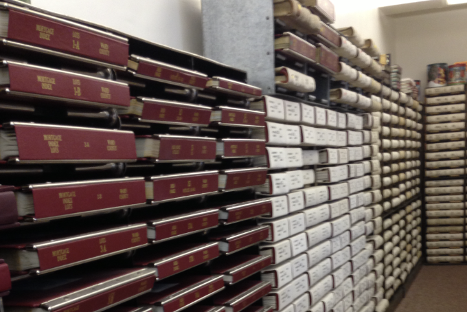 wall lined with record books