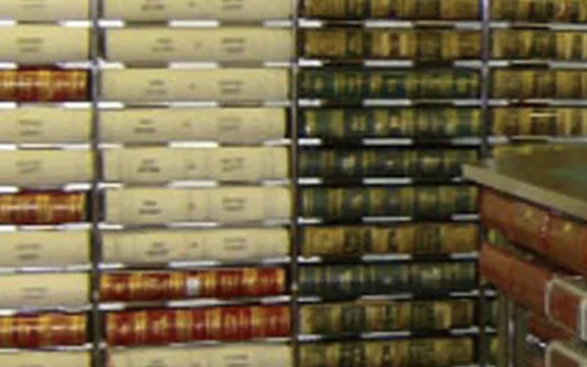 wall lined with record books