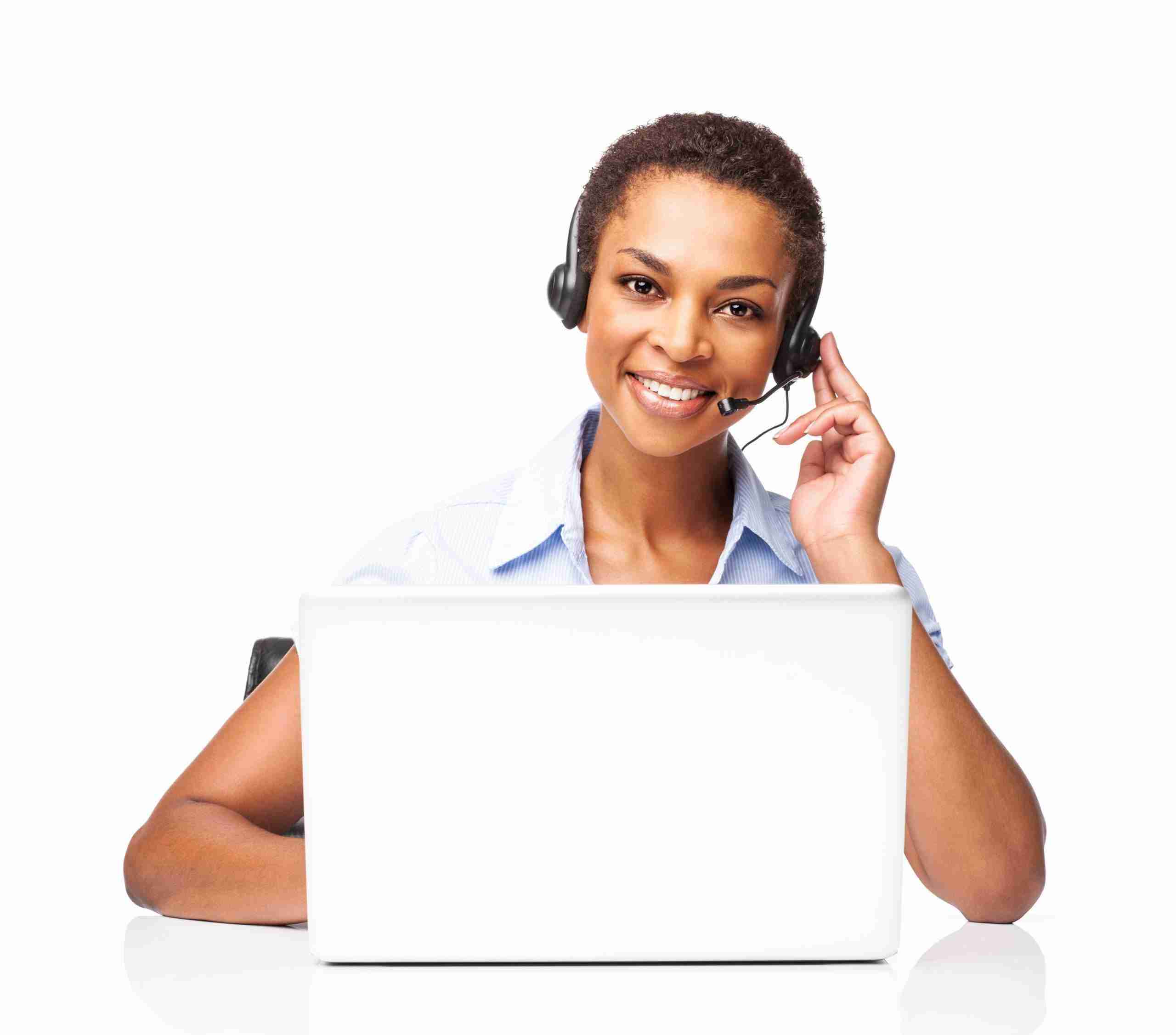 Woman with headset sitting in front of a laptop computer