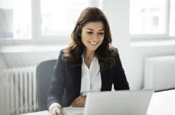Woman using laptop to notarize online